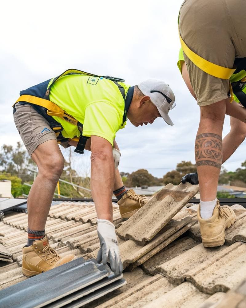 Leaky Roof roofer replacing concrete tiles on a Canberra home